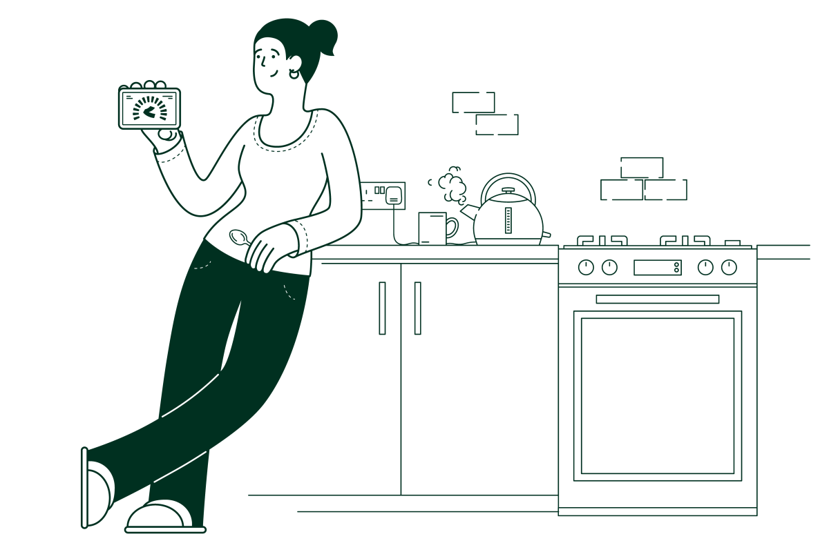 woman leaning on a kitchen worktop holding an energy smart meter