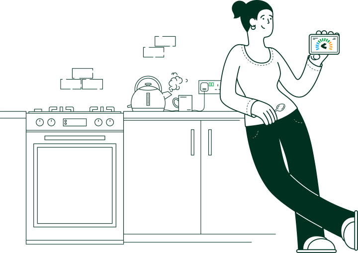 woman leaning on a kitchen worktop holding an energy smart meter